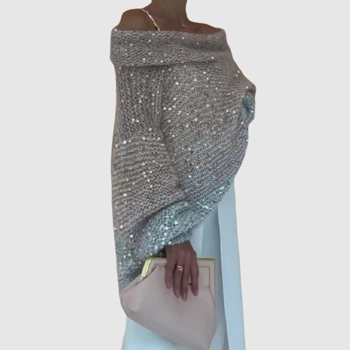Клара – Блестящ пуловер с открито рамо